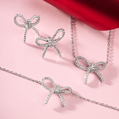 sada stříbrných šperků s kubickou zirkonií - motiv mašle