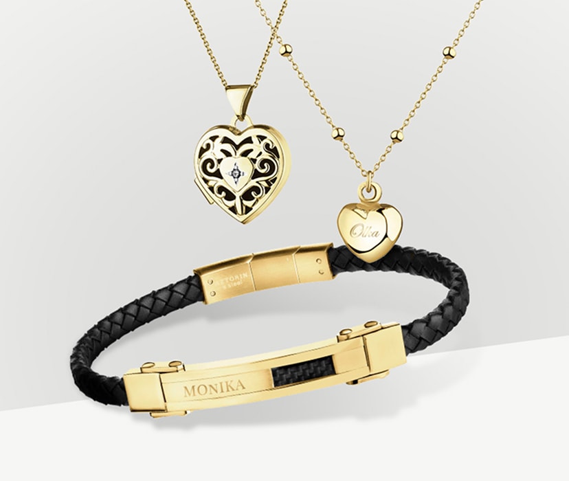Zlaté náhrdelníky s přívěskem ve tvaru srdce a pánský náramek
