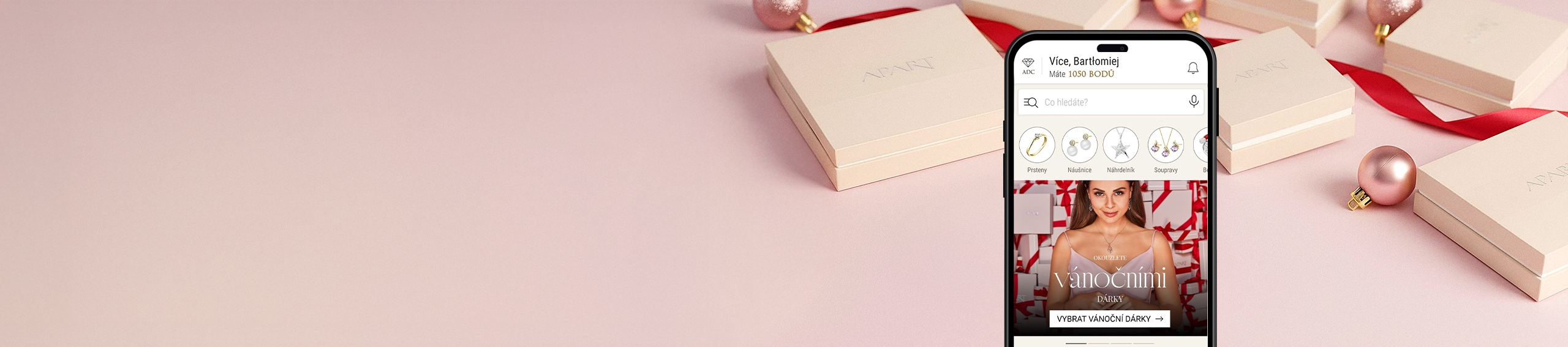 smartphone s otevřenou aplikací Apart Diamond Club