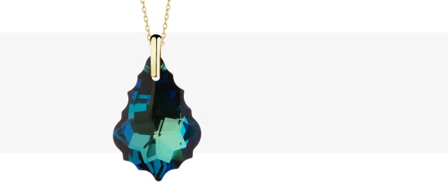 Zlatý přívěsek s kamenem