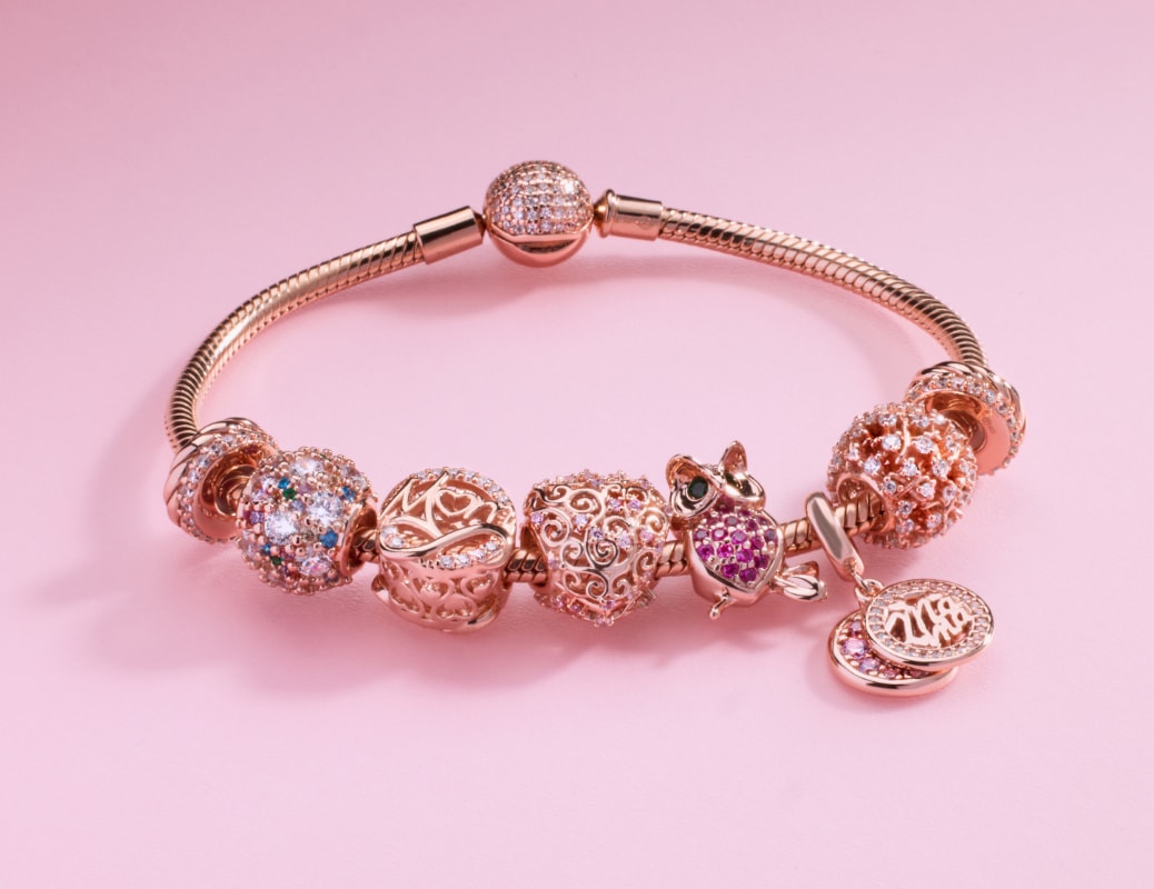Gold bracelet with charms