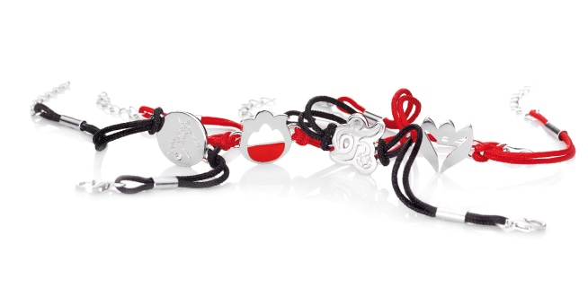 Black and red string bracelets with silver accents