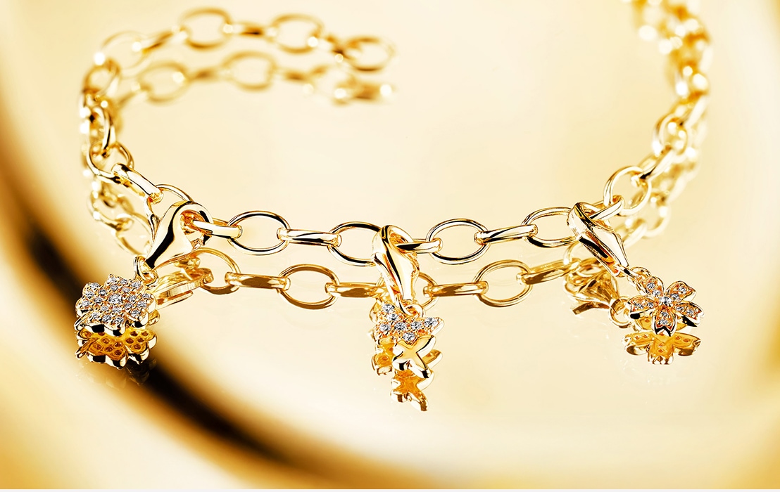 gold bracelet with pendants from the charms collection