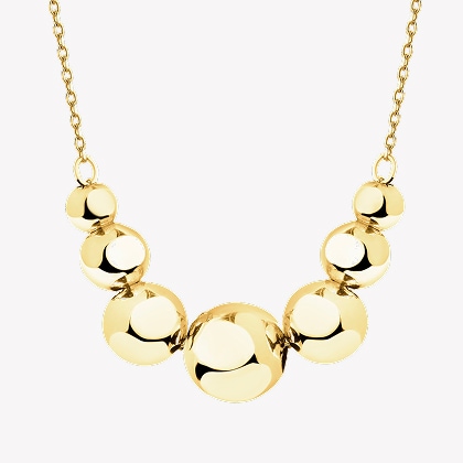 Gold necklace - Balls themed jewelry