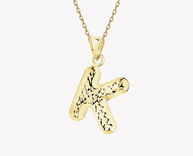Gold pendant - letter K