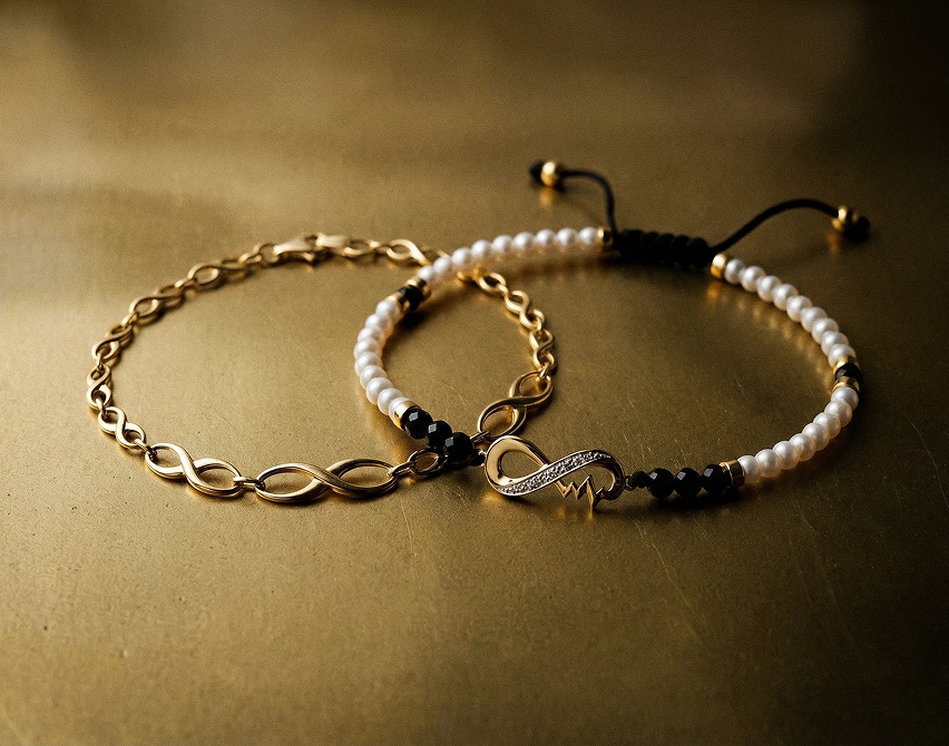 Yellow gold bracelet with diamonds and a bracelet with diamonds, pearls, and yellow gold elements - infinity