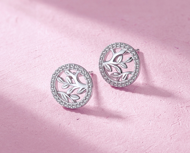 Round silver earrings with a twig motif