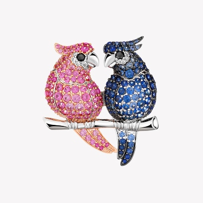 Brooch with colorful parrots