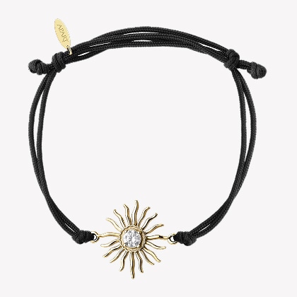 Black bracelet with a gold sun
