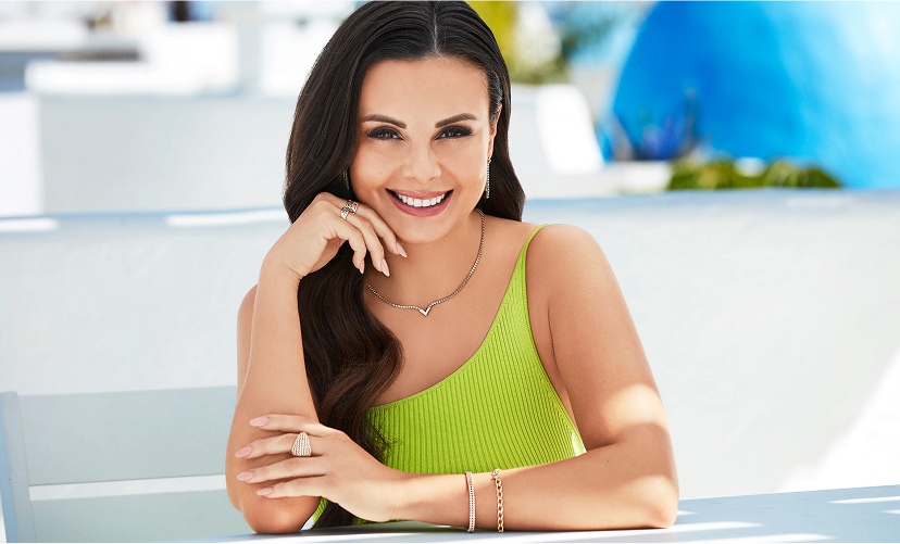 Monika Bagarova presenting jewelry from the secret garden collection