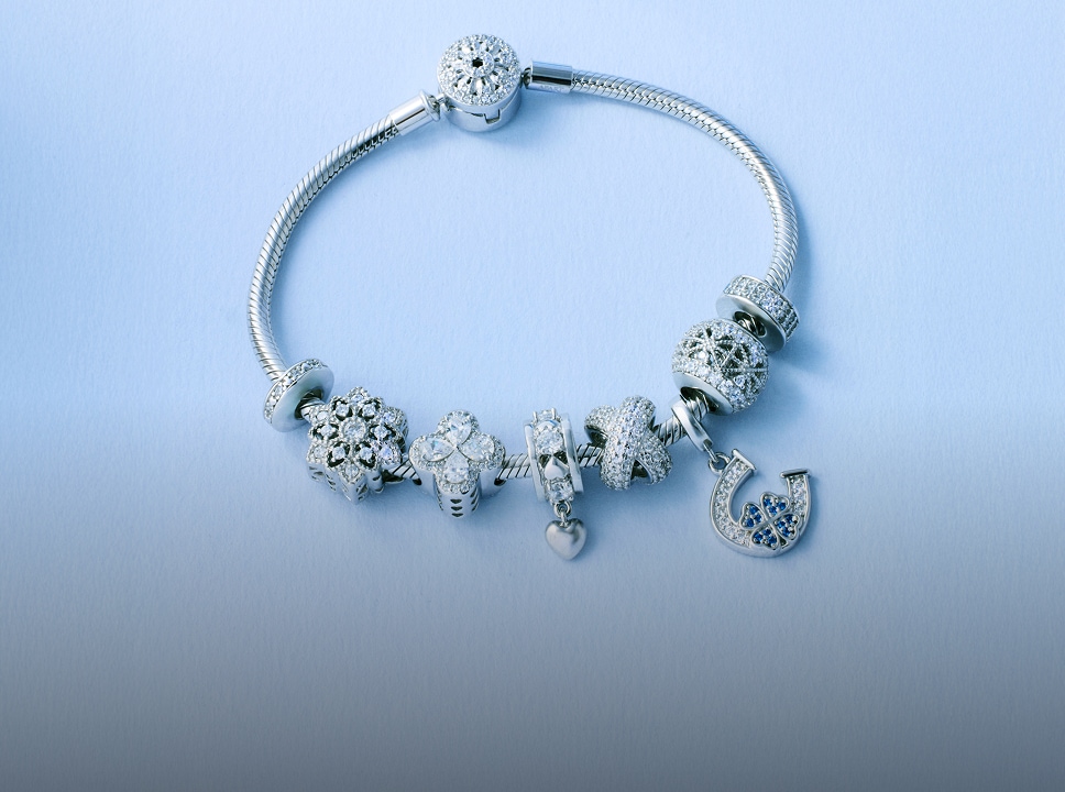 gold bracelet with beads pendants