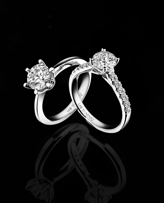 Two white gold rings with lab diamonds