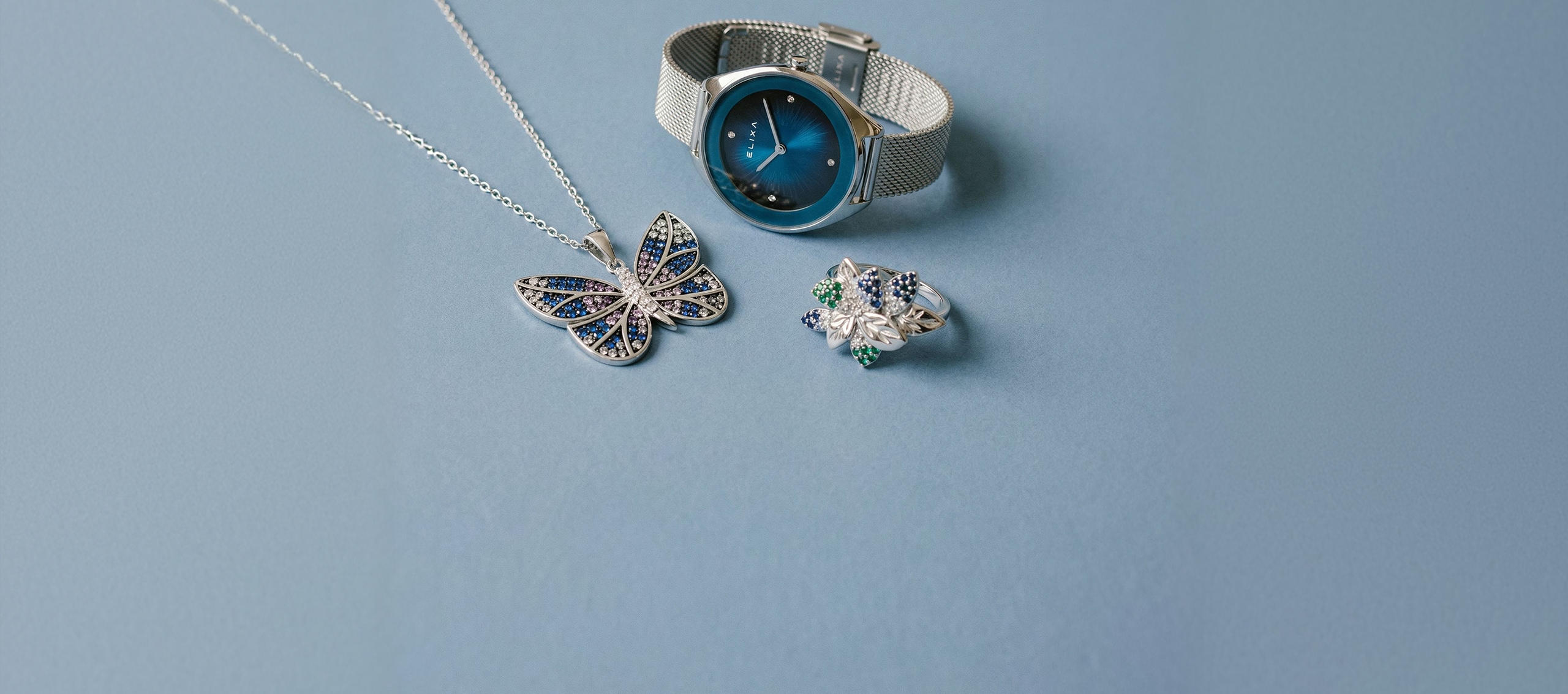 Watch, butterfly pendant and silver ring