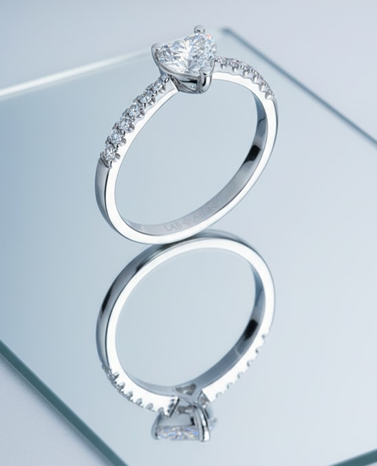 White gold ring decorated with lab diamonds