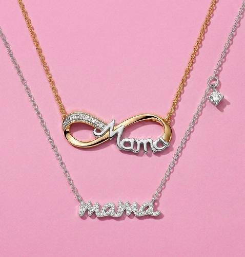 gold and silver pendant with the inscription mama