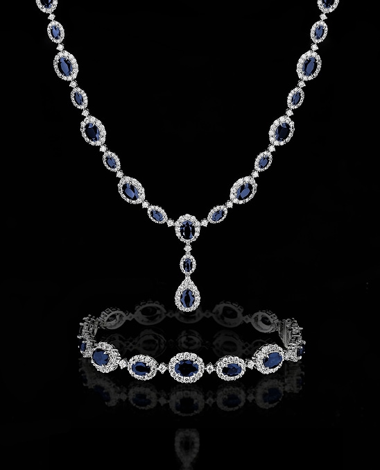 White gold bracelet and necklace decorated with diamonds and sapphires