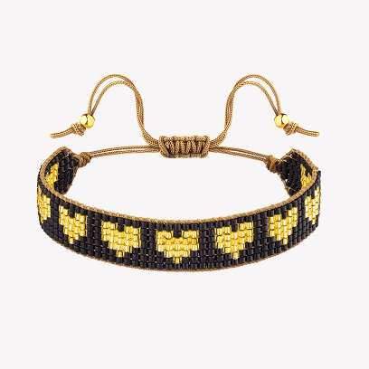 Fabric bracelet with heart-shaped gold elements