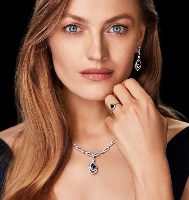 Anna Jagodzińska in a jewelry style with diamonds and sapphires in white gold