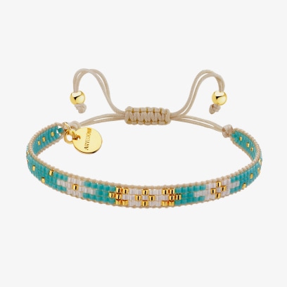 Materiałowa bransoletka z złotymi wstawkami z kolekcji nomadica od artelioni