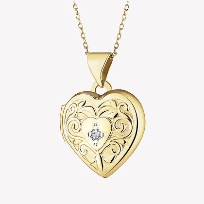 Zawieszka z żółtego złota z diamentem - puzderko - serce