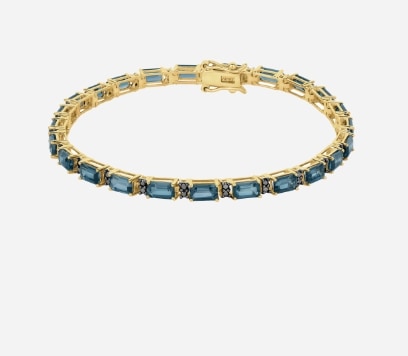 Bransoletka z elementami z mosiądzu pozłacanego i szklanymi koralikami