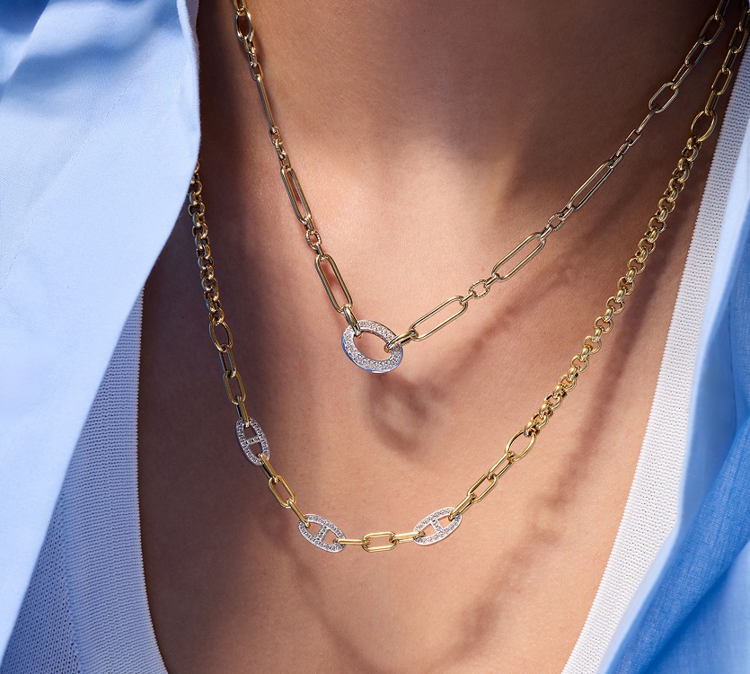 Złote naszyjniki z srebrnymi zawieszkami z cyrkoniami