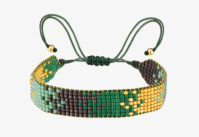 Bransoletka z elementami z żółtego złota i koralikami