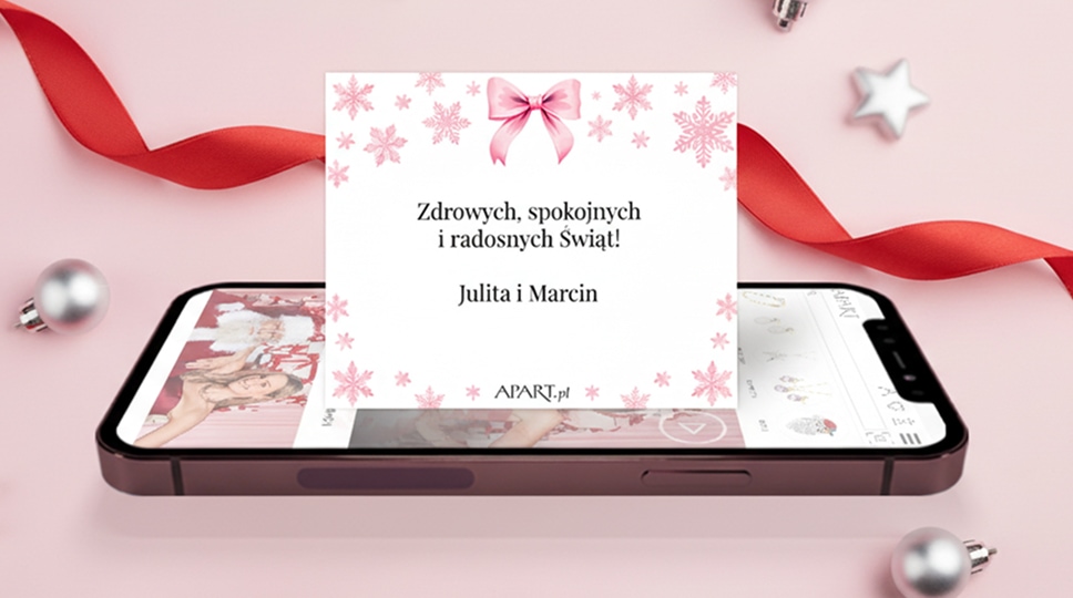 Telefon a na nim e-karta z świątecznymi życzeniami