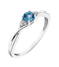 Pierścionek z białego złota z topazem