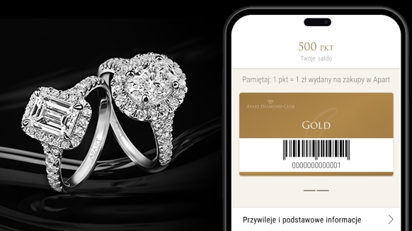 Aplikacja ADC wyświetlana na smartfonie, oraz dwa pierścionki z diamentami