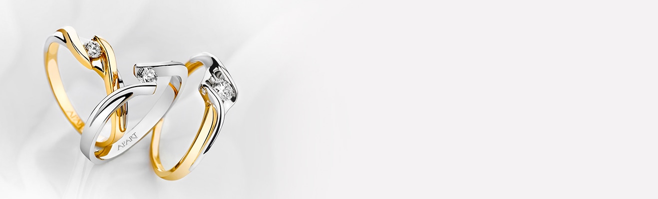 Pierścionek zaręczynowy z białego i żółtego złota z brylantem