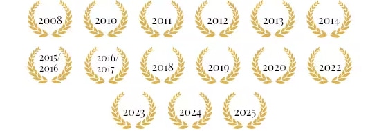 Logo otrzymanej nagrody - wieniec z datami za dany rok