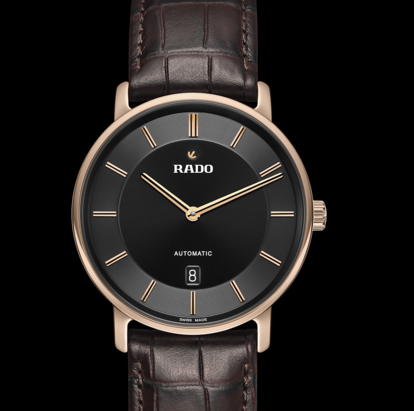 Zegarek męski marki Rado z czarną tarczą i brązowym, skórzanym paskiem