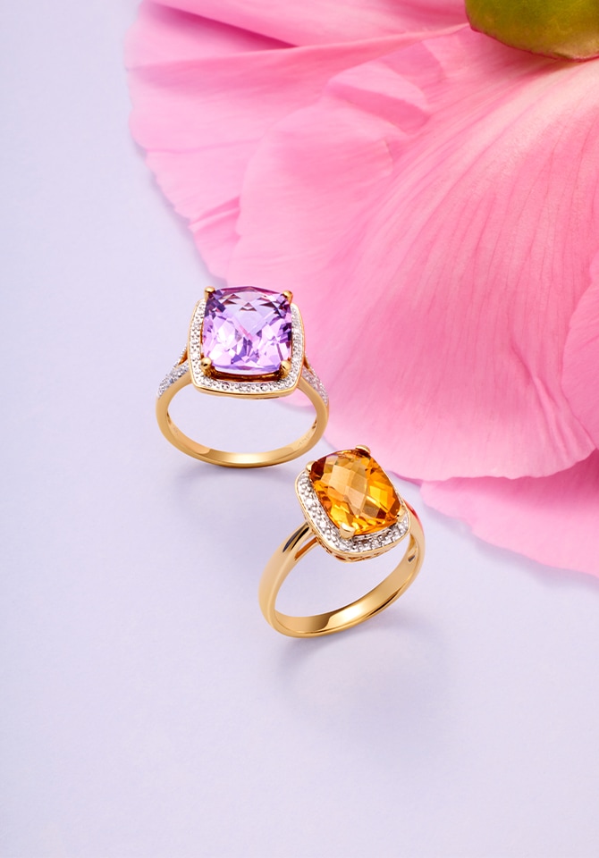 Dwa pierścionki z żółtego złota z kamieniami i cyrkoniami