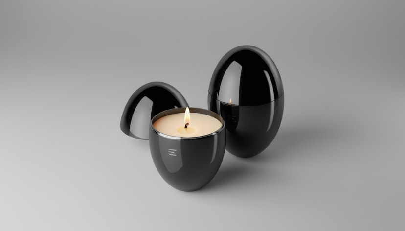 Soy candle in a black oval package